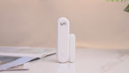 Smart door and window opener sensor with audible alarm and warning light; remote control via Tuya app 