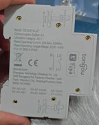 Original TO-Q-SYS-JZT side-label photograph showing ZigBee 3.0, AC-1, 50A maximum and AC90–240V ratings.